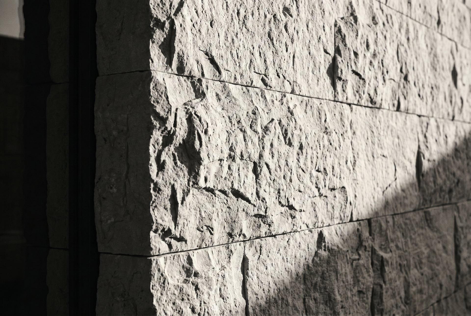 A facade detail in pale stone