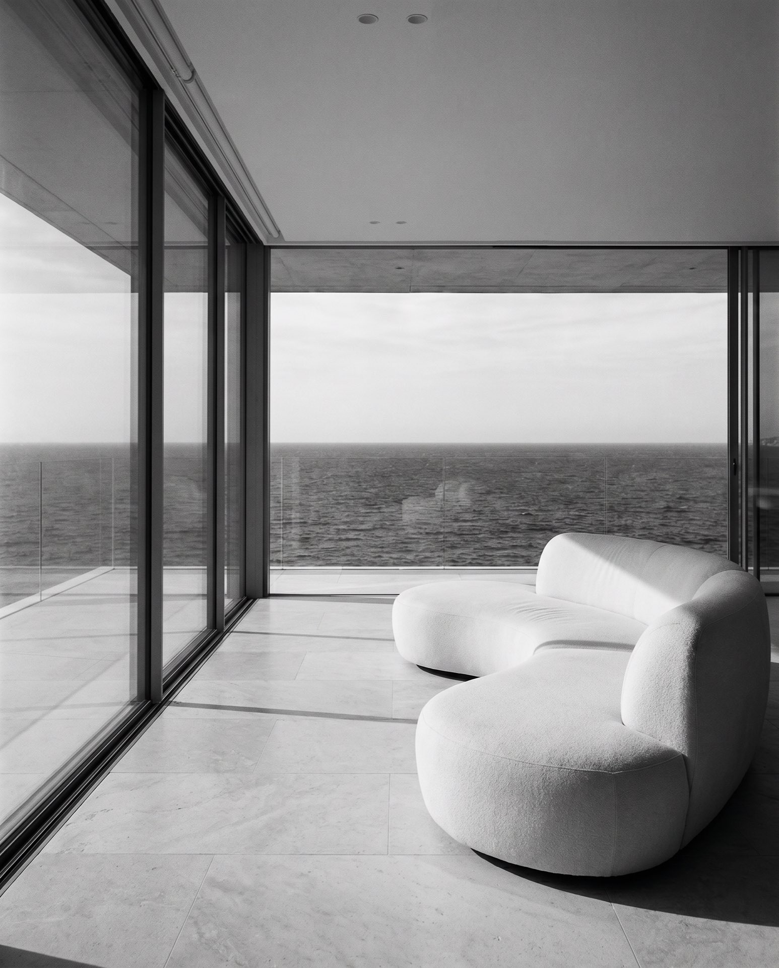 A living room open to the sea