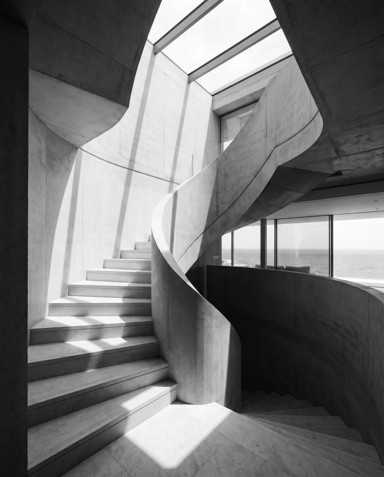 A stair turning through three floors
