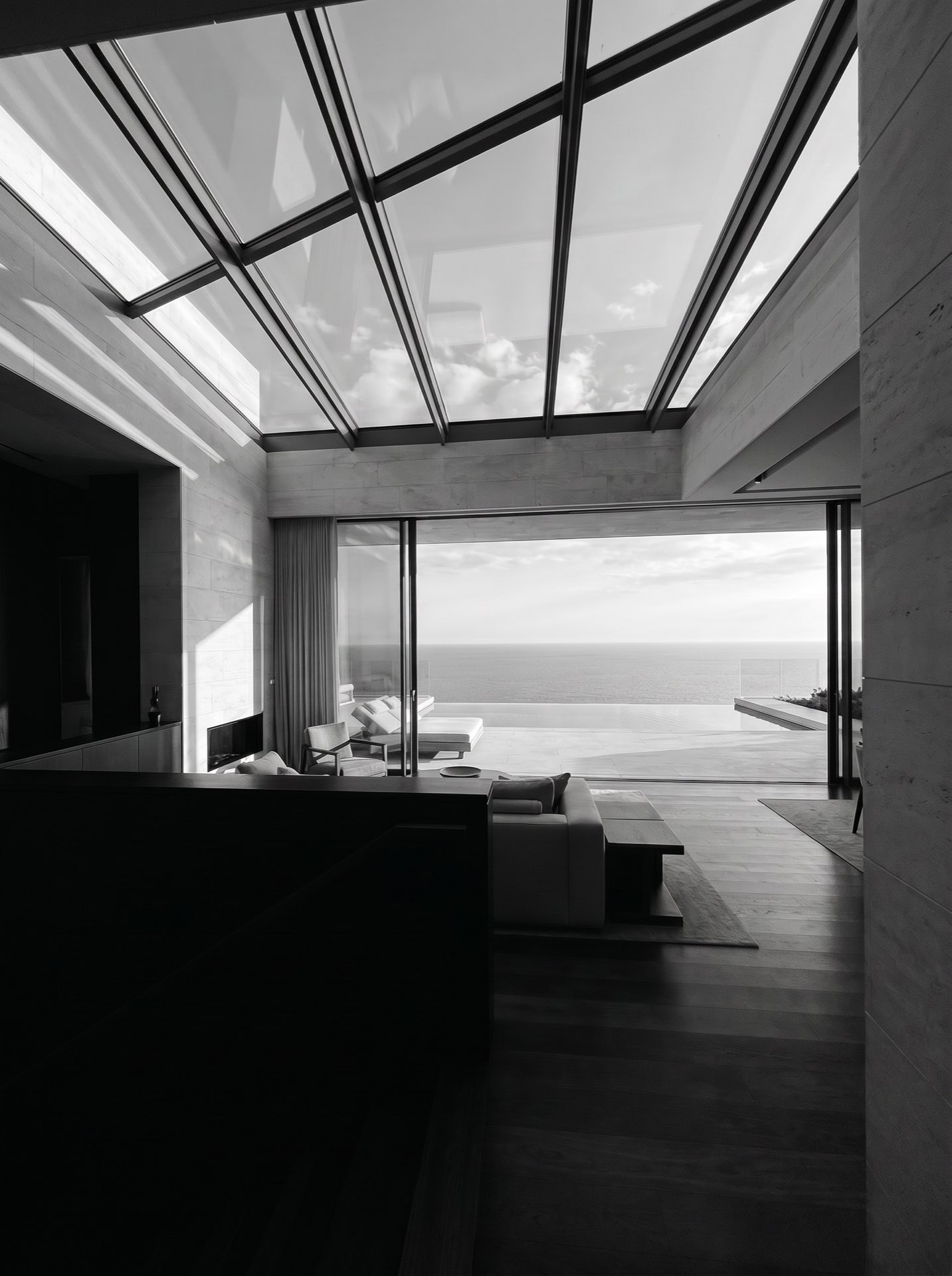 A penthouse under a glass roof with a private terrace